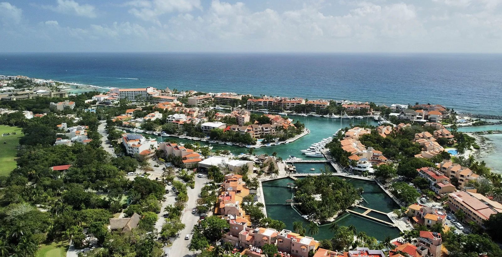 Aerial view of Puerto Aventuras: the marina, dolphin lagoons and Caribbean coastline, Riviera Maya